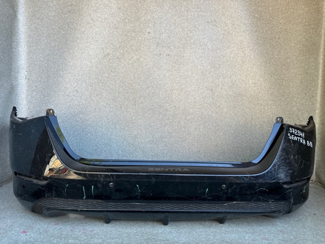 Задний бампер 850226LB4J NISSAN