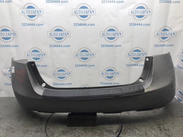 Задний бампер 85022JM04H NISSAN
