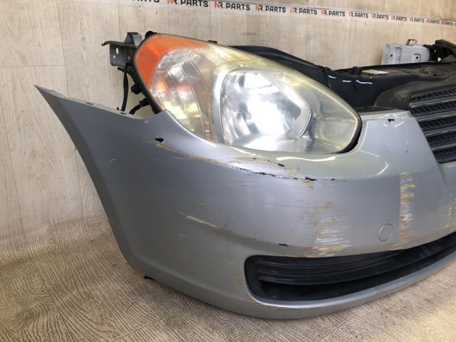 Передний бампер 865111E000 HYUNDAI
