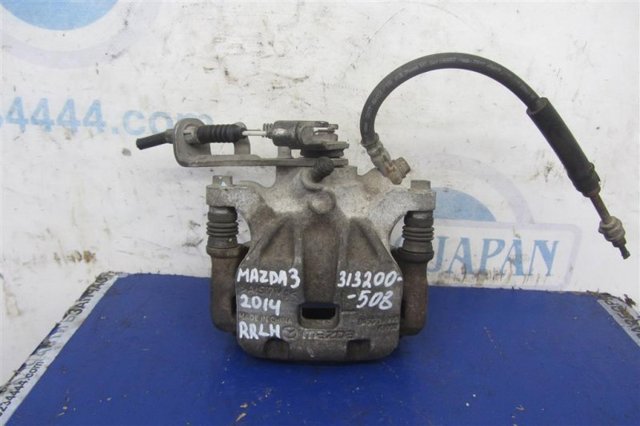 Суппорт тормозной левый задний B4Y72699ZD MAZDA