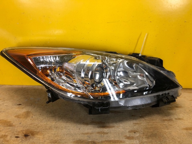 Вставка фары правой BBP2510K0L MAZDA