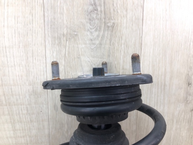 Стойка передняя правая BHN234700C MAZDA