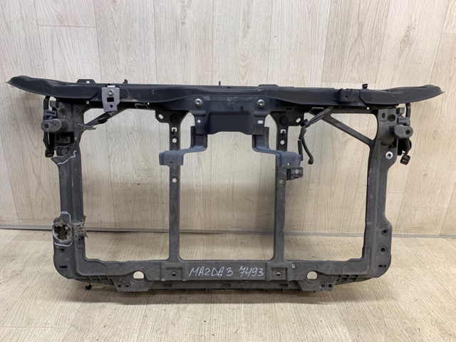 Суппорт радиатора вертикальный / монтажная панель крепления фар BJS753110B MAZDA