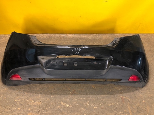 Задний бампер D65150221 MAZDA
