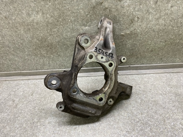 Кулак поворотный передний левый DE9Z3K186A FORD