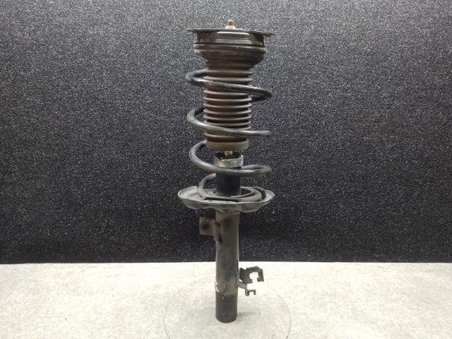Стойка передняя правая E43024CL1B NISSAN