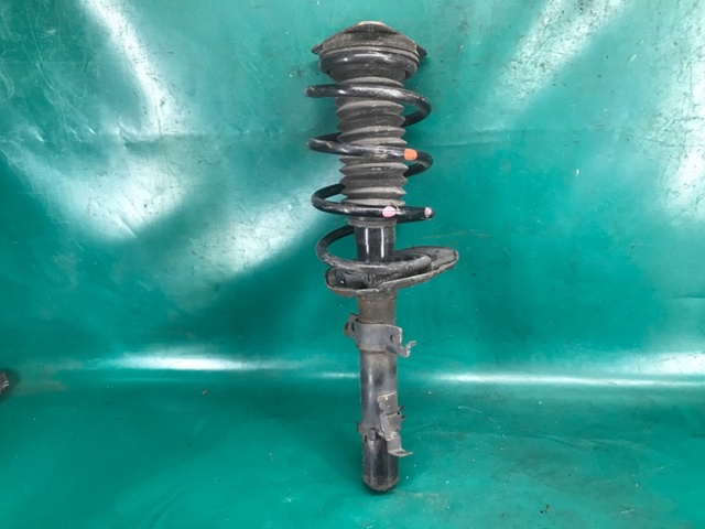 Амортизатор подвески передний левый E43034BA1C NISSAN