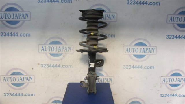 Амортизатор подвески передний левый E4303JN01C NISSAN