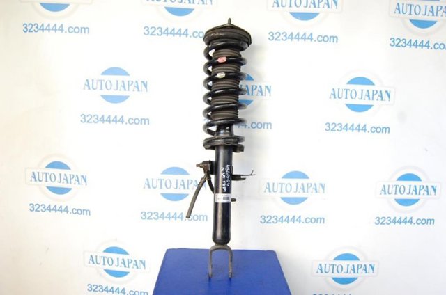 Амортизатор передней подвески правый E6110EG00D NISSAN