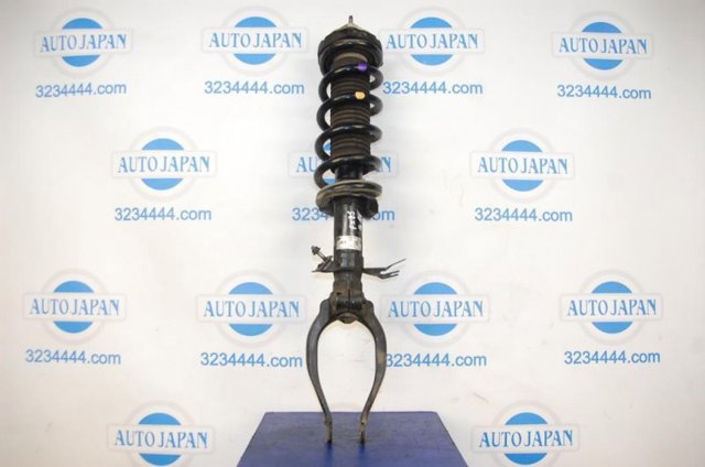 Передний правый амортизатор E6110JK50D NISSAN