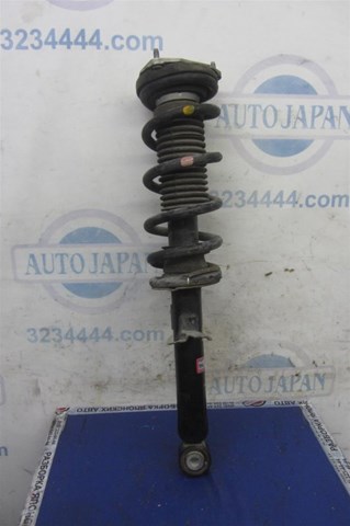 Амортизатор подвески передний левый E6111JK01B NISSAN