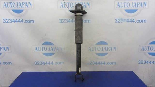 Амортизационная стойка задняя E6210ZX00A NISSAN