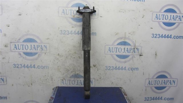 Стойка амортизатора задняя EH4628910 MAZDA