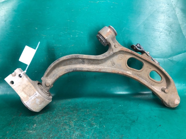 Рычаг передней подвески нижний левый FA5Z3079B FORD