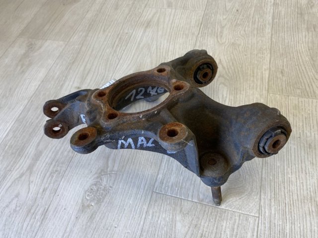 GHR12611XA MAZDA Цапфа (поворотный кулак) задний правый купить в Сумы