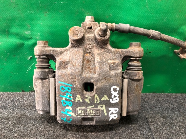 Задний правый суппорт L2Z22698ZB MAZDA