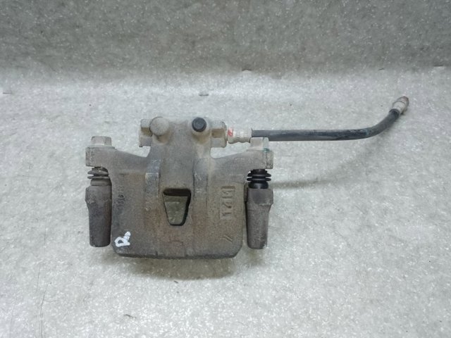 Тормозной суппорт правый задний MN116310 MITSUBISHI