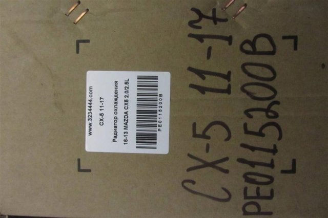 Радиатор основной PE0115200B MAZDA