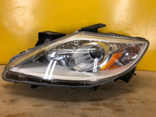 Вставка фары левой TE8051041C MAZDA