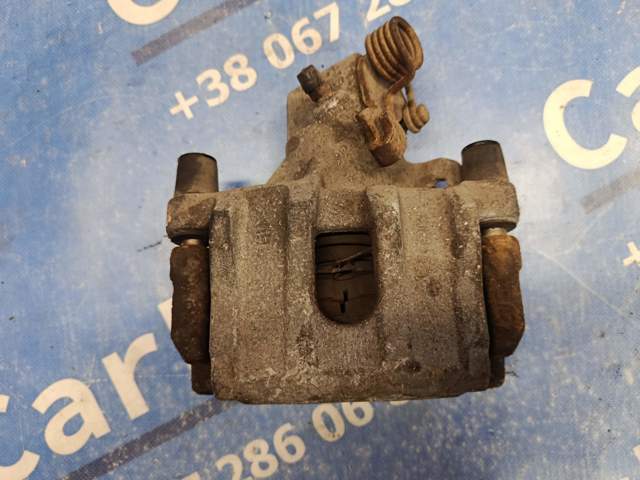 Суппорт тормозной задний правый 2210213 FORD