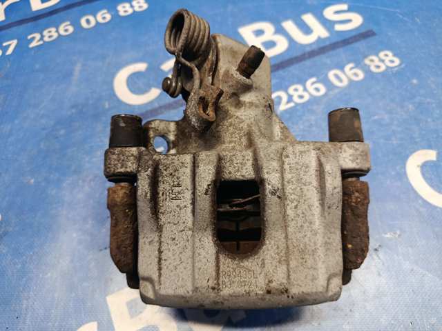 Суппорт тормозной левый задний Ford Focus 3