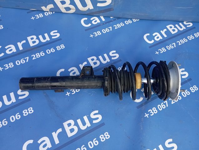 Передний правый амортизатор 31316785590 BMW