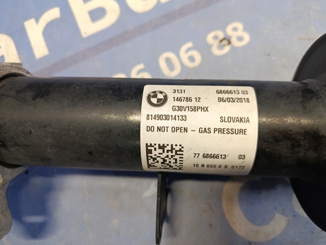 Амортизатор подвески передний левый 31316866613 BMW