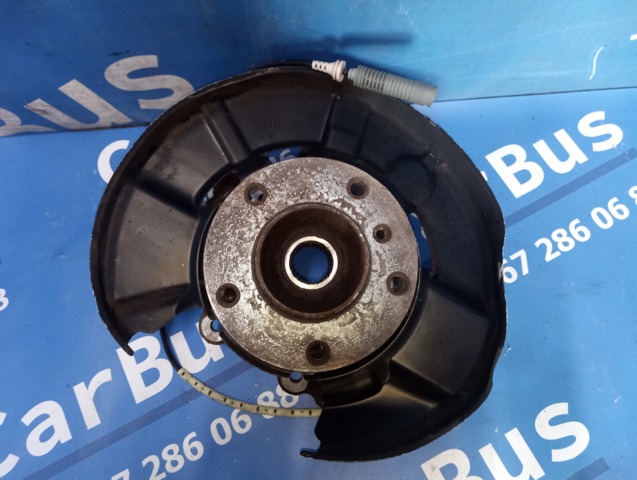 Кулак поворотный левый 33326774809 BMW