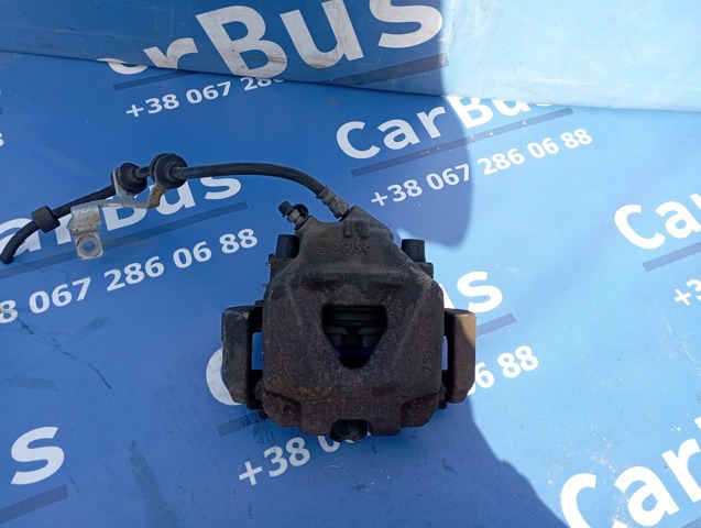 Суппорт тормозной передний левый 34116778145 BMW