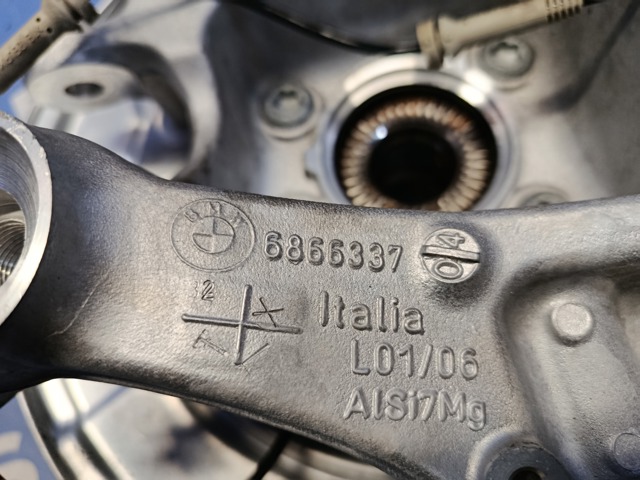 Цапфа - поворотный кулак задний, левый 6866337 BMW
