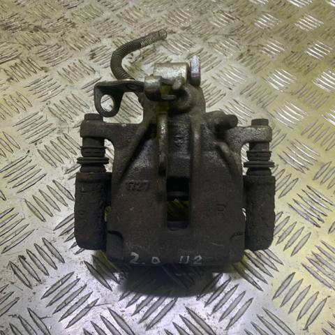 7701056165 RENAULT Суппорт тормозной задний правый купить в Винница