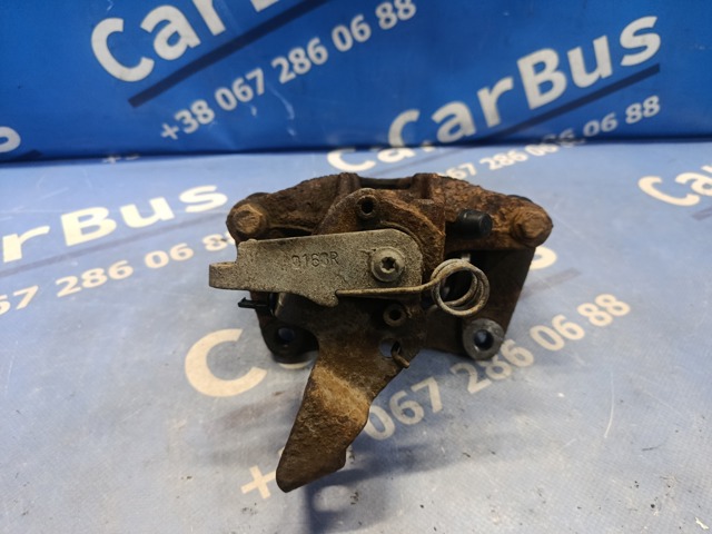 7701208036 RENAULT Суппорт задний левый купить в Львов