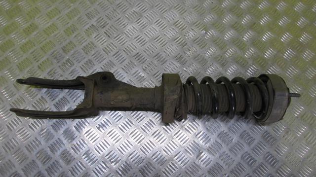 Амортизатор передний левый 7P6413031AK VAG