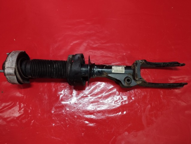 Амортизаторная стойка передняя левая 7P6413031AN VAG