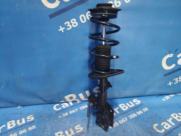 Амортизаторная стойка передняя левая E4303BX84A NISSAN