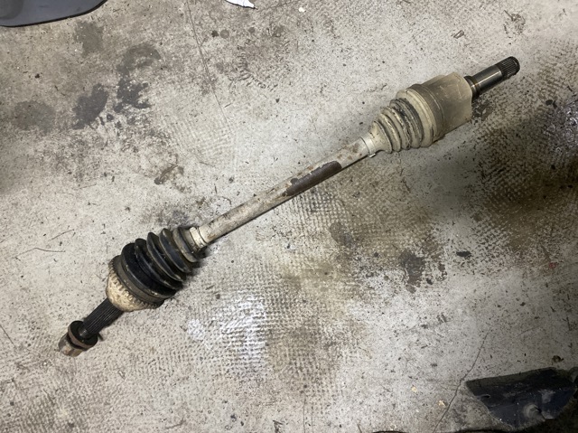 Полуось передняя левая 1C153B437CG FORD