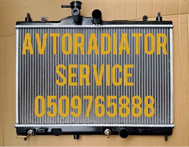 Радиатор системы охлаждения двигателя Ниссан Тиида