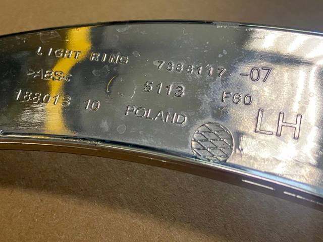 7388117 BMW Рамка (облицовка) фары левой купить в Павлоград
