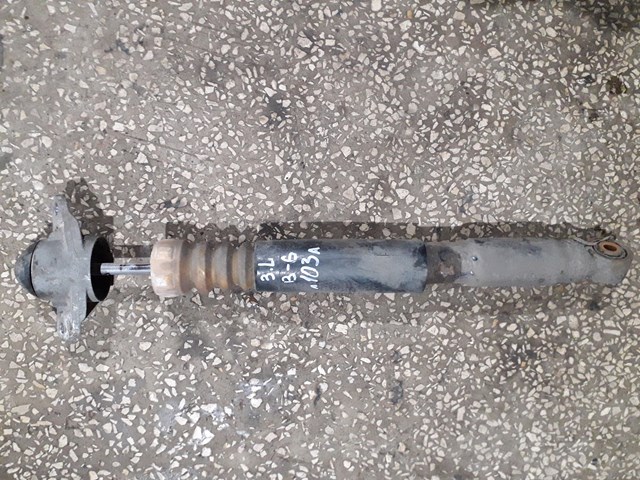 Задний амортизатор Фольксваген Пассат B6