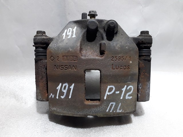 410114U100 NISSAN Суппорт тормозной передний левый купить в Ирпень