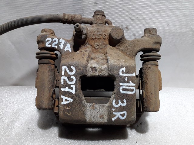 Суппорт тормозной задний правый 44001EM11A NISSAN