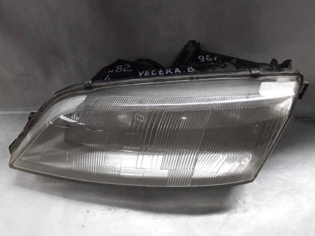 Фара левая 90512711 OPEL