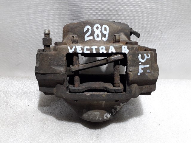 Суппорт тормозной левый задний 90540170 GM