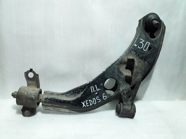 Рычаг передней подвески нижний левый GE4T34350C MAZDA