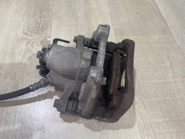 FB5Z2553A Суппорт задний левый купить Львов