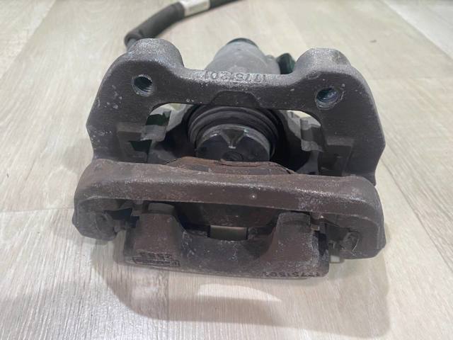 FB5Z2553A FORD Суппорт задний левый купить в Запорожье