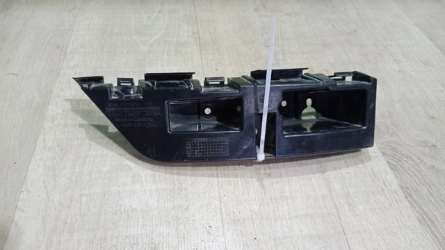 Левый кронштейн крепления бампера заднего KT4B17D949A FORD