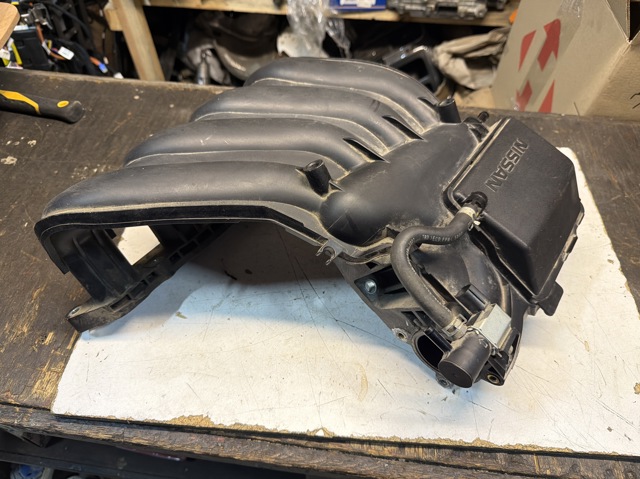 Коллектор впускной 140011HK0A NISSAN