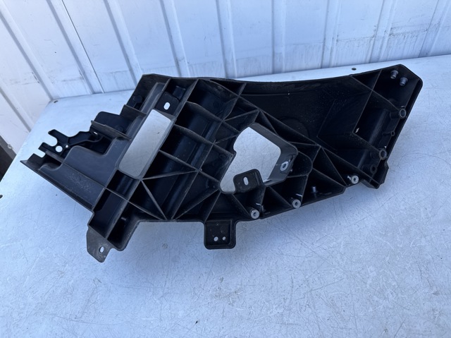 TESLA 104335700F Суппорт радиатора левый (монтажная панель крепления фар) в наличии Сумы