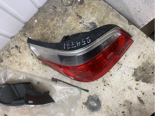 63217165737 BMW Фонарь задний левый внешний купить в Николаев